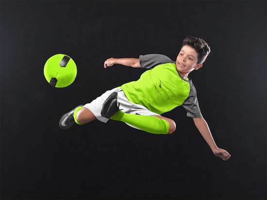 custom_soccer_jerseys_boy_doing_a_scissor_side_kick_a16605__1_